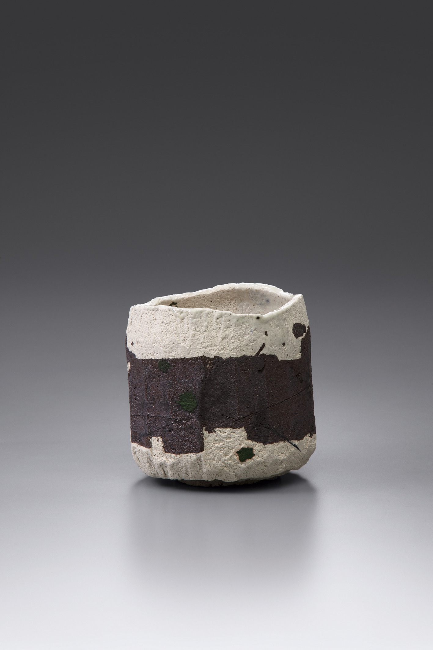 Yakinuki-type ‘Rock’ White Raku tea bowl, Tan (sever, cut out)